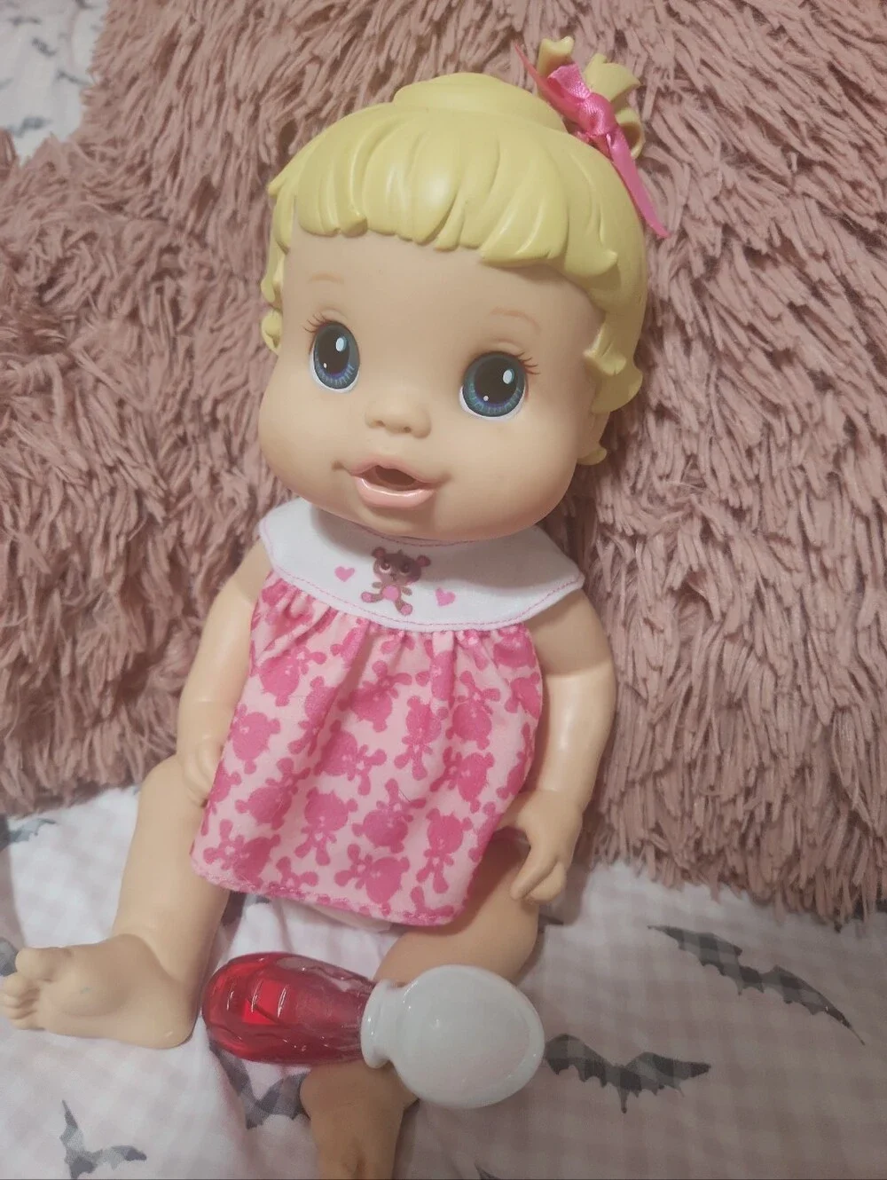 Hasbro Baby Alive Make Me Better baby doll with blonde hair